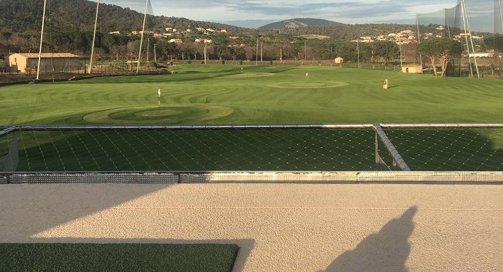 Jacksonville Synthetic turf beside natural grass golf course