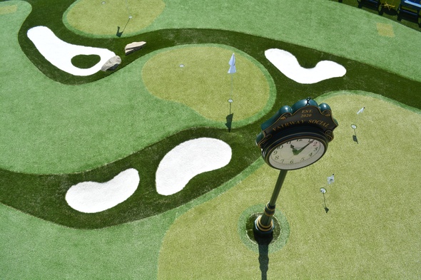 Jacksonville Synthetic grass golf course with sand traps and golfers